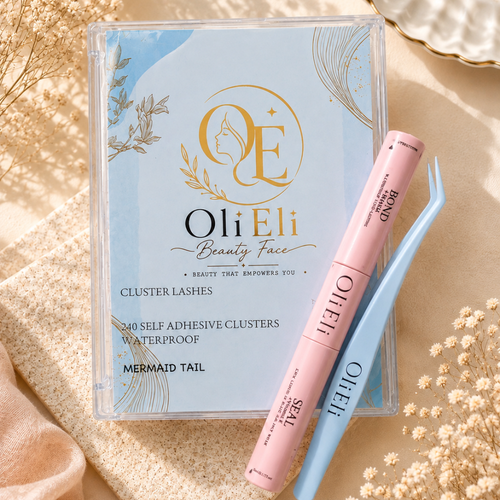 Oli Eli Beauty Mermaid Tail cluster lash adhesive kit in a clear case, featuring a pink glue tube and light blue tweezers on beige fabric with dried flowers.