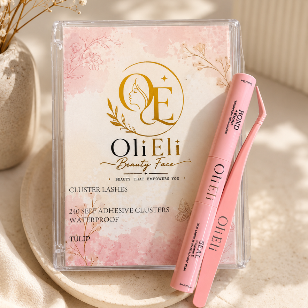 Oli Eli Beauty Face cluster lashes set in a clear plastic case, featuring a pink and white packet with gold branding and two pink lash tools placed beside it on a beige surface.